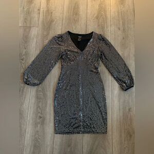 Alexa B nites woman’s dress perfect for date night. NWOT